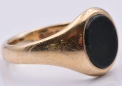 A 9ct gold signet ring set with bloodstone, 3.8g, size N