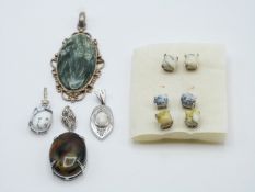 Four silver pendants set with dentric agate, howlite, seraflinte and pietersite and three pairs of