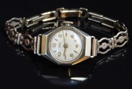 Uno 9ct gold cased ladies wristwatch with gold hands and numerals, silver dial and signed 15 jewel