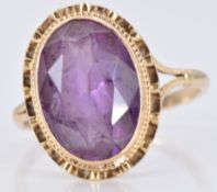 A 9ct gold ring set with an oval cut amethyst, 3.6g, size P