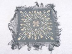 A 19th/20thC Chinese shawl with printed and gold thread decoration and fringe, 210 x 210cm including