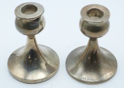 Pair of Elizabeth II hallmarked silver candlesticks, Birmingham 1959 maker's mark WA, height 10cm
