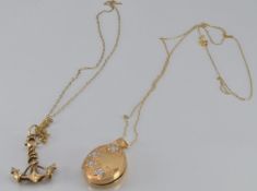 A 9ct gold locket, 9ct gold anchor pendant, 9ct gold cross pendant and two 9ct gold chains, 5.4g
