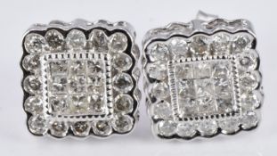 A pair of 9ct white gold earrings set with square cut and round cut diamonds