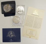2016 silver 1oz Britannia, 2010 Chinese silver panda and an 1879 silver Morgan US dollar, all with