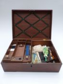 A late 19th/20thC sewing / needlework mahogany workbox with fitted lift out tray and accessories and