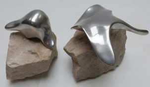 Two Canadian Hoselton polished aluminium sculptures of a stingray/mantaray and a seal raised on