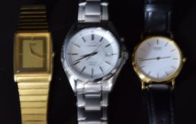 Three Seiko gentleman's wristwatches, one kinetic and two quartz, all in original boxes