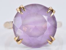 A 9ct gold ring set with a round cut amethyst, 4.7g, size O