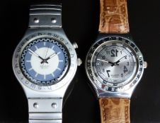 Two Swatch Irony wristwatches Backward YGS401 and one other, both in original boxes