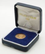 2002 Elizabeth II gold full sovereign in case, VF
