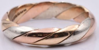 A 9ct gold tri-coloured ring, 3.9g, size N