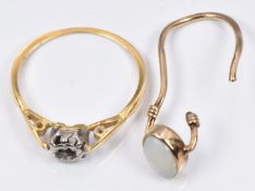 An 18ct gold ring (1.4g) and a 9ct gold section of ring (0.9g)