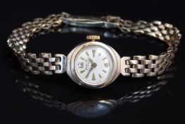 Avia 9ct gold ladies wristwatch with gold hands and hour markers, silver dial and 15 jewel movement,