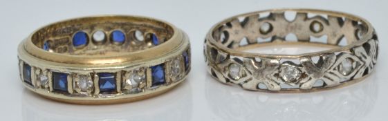 A 9ct gold eternity ring and another eternity ring, both set with paste, 6.1g, size P and K