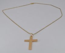 A 15ct gold cross, Birmingham 1913, 3.7g and 9ct gold chain, 1.9g