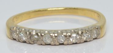 An 18ct gold ring set with diamonds in a platinum setting, 2.4g, size O/P