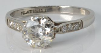 Art Deco platinum ring set with a diamond of approximately 0.6ct with diamond set shoulders, 2.5g,