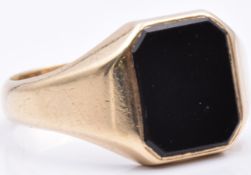 A 9ct gold signet ring set with onyx, 6.4g, size Q/R