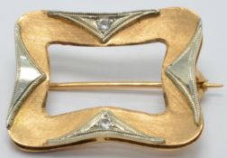 An 18ct gold bi-coloured brooch set with two cubic zirconia, 2 x 2.5cm, 6.2g