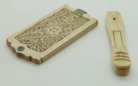 Late 19th/20thC ivory dance card, the covers with pierced decoration, 9.5 x 5cm, together with a