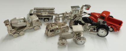 A collection of novelty miniature clocks relating to lorries, tractors etc