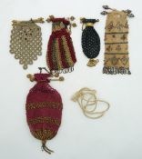 Five 19thC cut steel and embroidery purses with ornate bar clasps, longest 13cm