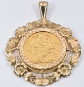 A 9ct gold pendant mount set with a 1911 gold full sovereign, 14.8g