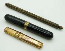Three 19thC needle cases including a lacquer cigar shaped example, engraved brass etc, largest 17cm