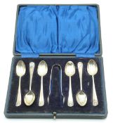 Cased set of six hallmarked silver shell topped pattern spoons and nips, Sheffield 1918 maker