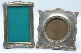 Two hallmarked silver mounted photograph frames, both with oak easel backs, one to suit approx 5 x 3