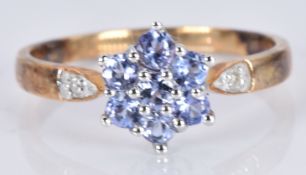 A 9ct gold ring set with amethysts and diamonds, 2.5g, size P