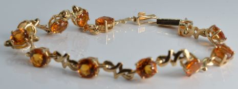 A 9ct gold bracelet set with citrines