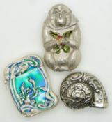 Three novelty silver plated vesta cases, one formed as a monkey, another with Art Nouveau enamel