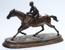 Silver plated figure of a jockey on horseback, marked Mene to base, H27 x L42cm