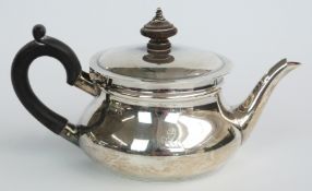 George V hallmarked silver bachelor's teapot, London 1911 maker Charles Edwards, length 16cm, weight