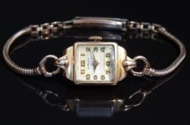 Le Phare 18ct gold ladies wristwatch with gold hands and Arabic numerals, champagne dial and