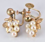 A pair of 9ct gold earrings set with pearls in the form of bunches of grapes, in original box