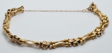 A 9ct gold early 20thC bracelet, 14.9g