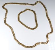A 14ct gold curb link necklace and bracelet, 83.1g