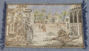 An early 20thC North African rug decorated with an Arab street scene, 105 x 60cm