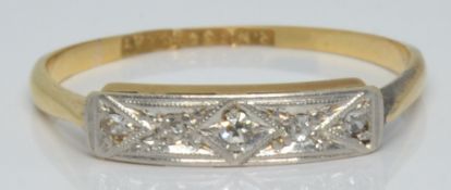 Art Deco 18ct gold ring set with five diamonds in a platinum setting, 1.3g, size K