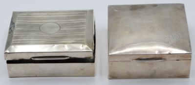 Two hallmarked silver cigarette boxes, one Birmingham 1925 the other Chester 1922, width of wider