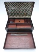 A late 19th/20thC sewing / needlework metal workbox with cushion top, fitted wooden interior, lift