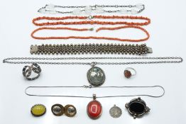 A collection of silver jewellery including earrings, coral necklaces, necklaces, pietra dura