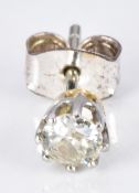 A platinum earring set with a diamond of approximately 0.2ct