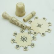 A collection of 19thC Indian Madras ware ivory sewing / needlework accessories including a figural