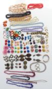 A collection of costume jewellery including interchangeable hoop earrings, vintage brooches, vintage