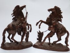 A large pair of spelter Marly Horses, height 51cm
