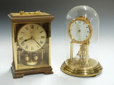 Kundo anniversary clock with wind-up movement, under glass dome, H22cm, together with a Hettich